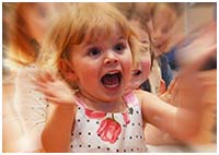 Little girl at a Professor Dan Slater magician party